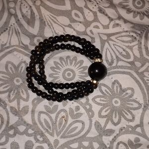 Womens black bracelet with yellow rhinestones